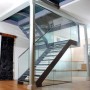 Rampe d'escalier en verre et métal noir